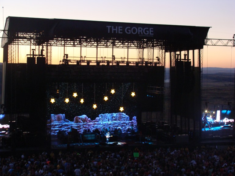 John Mayer at the Gorge with the  beautiful sunset in the background